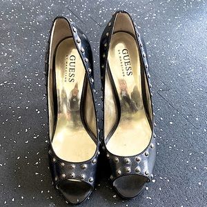 Guess size 5/12 black leather gold stiletto with studs